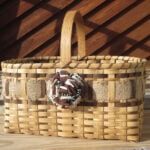 A market basket adorned with burlap and flowers